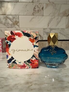 gimmicks by BKE Blue Glass Bottle with Gold Cap Body Oil